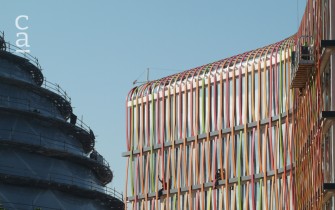 Close-up of hotel facade installation resembling traditional & colourful weaved basket (livingspaces.net)