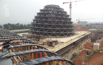Ongoing dome construction showing installation of facade on adjacent hotel  (livingspaces.net)