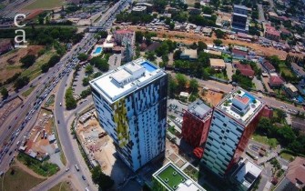 Aerial view of completed Villagio Vistas against background of Accra city (@worldsfinestdestinations_ on instagram)