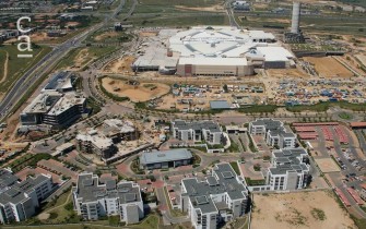 Aerial view of site showing back of mall and apartments in surrounding area (sapeople.com)