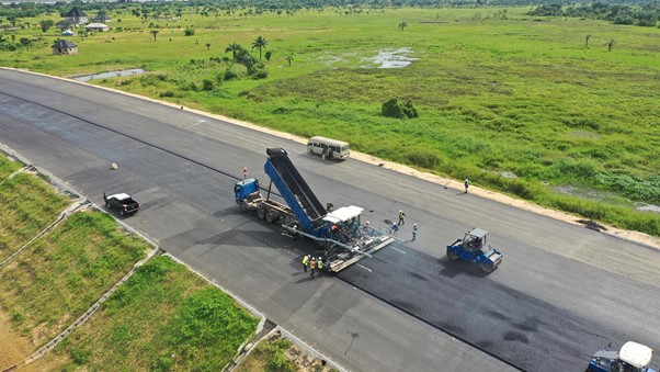 Laying of asphalt binder course on roadworks at Asaba site (second-river-niger-bridge.com)