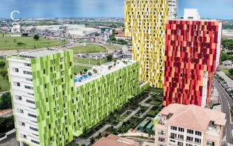 Aerial view of completed Villagio Vistas showing iconic Kente-patterned facades on Aqua, Azure and Alto Towers (@ghanarecords on twitter)