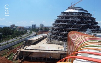 Ongoing dome construction showing installation of facade on adjacent hotel  (livingspaces.net)